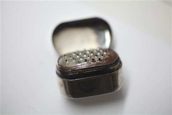 A George III bright cut engraved silver oval nutmeg grater, with hinged steel rasp, by Joseph Wilmore, 37mm.